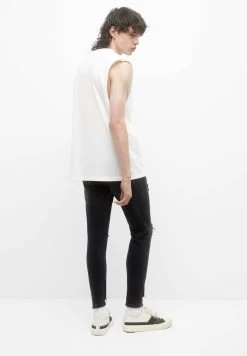 PULL & BEAR Ripped Carrot Fit - Slim Fit Jeans - Black -PULL BEAR Winkel 2f28f3979612483e8e0b08662f257cdc